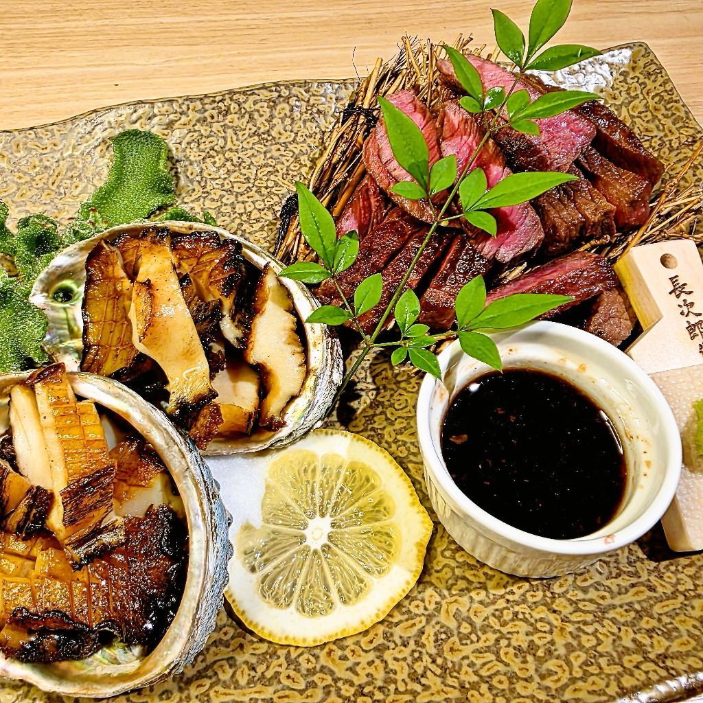 アワビと牛肉料理
